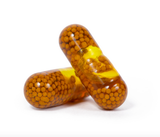 Two of Elixinol Life's Joints Rejoice Capsules stacked on top of each other